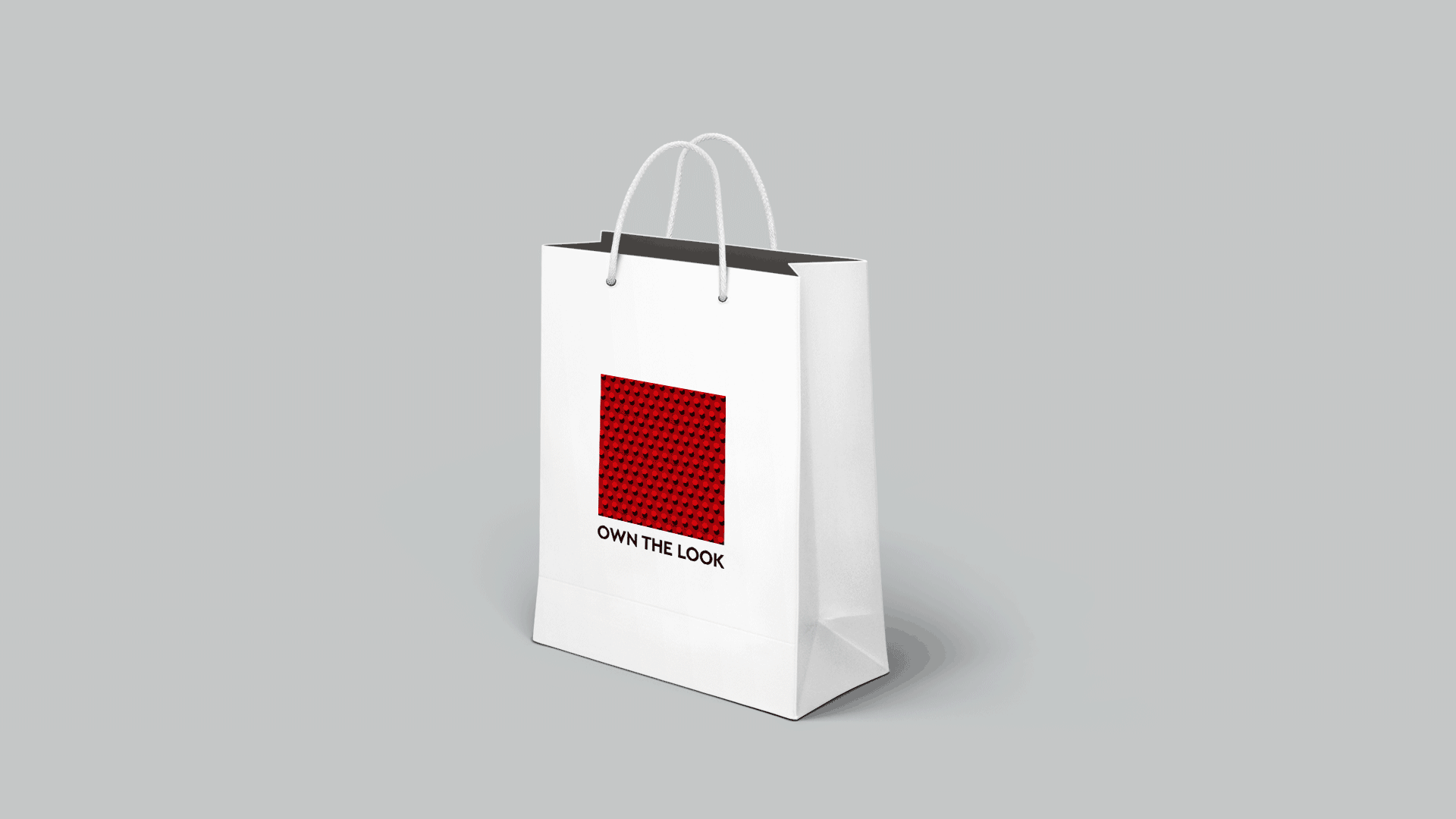 Edgars paper bag with own the look and various patterns masked into red square gif